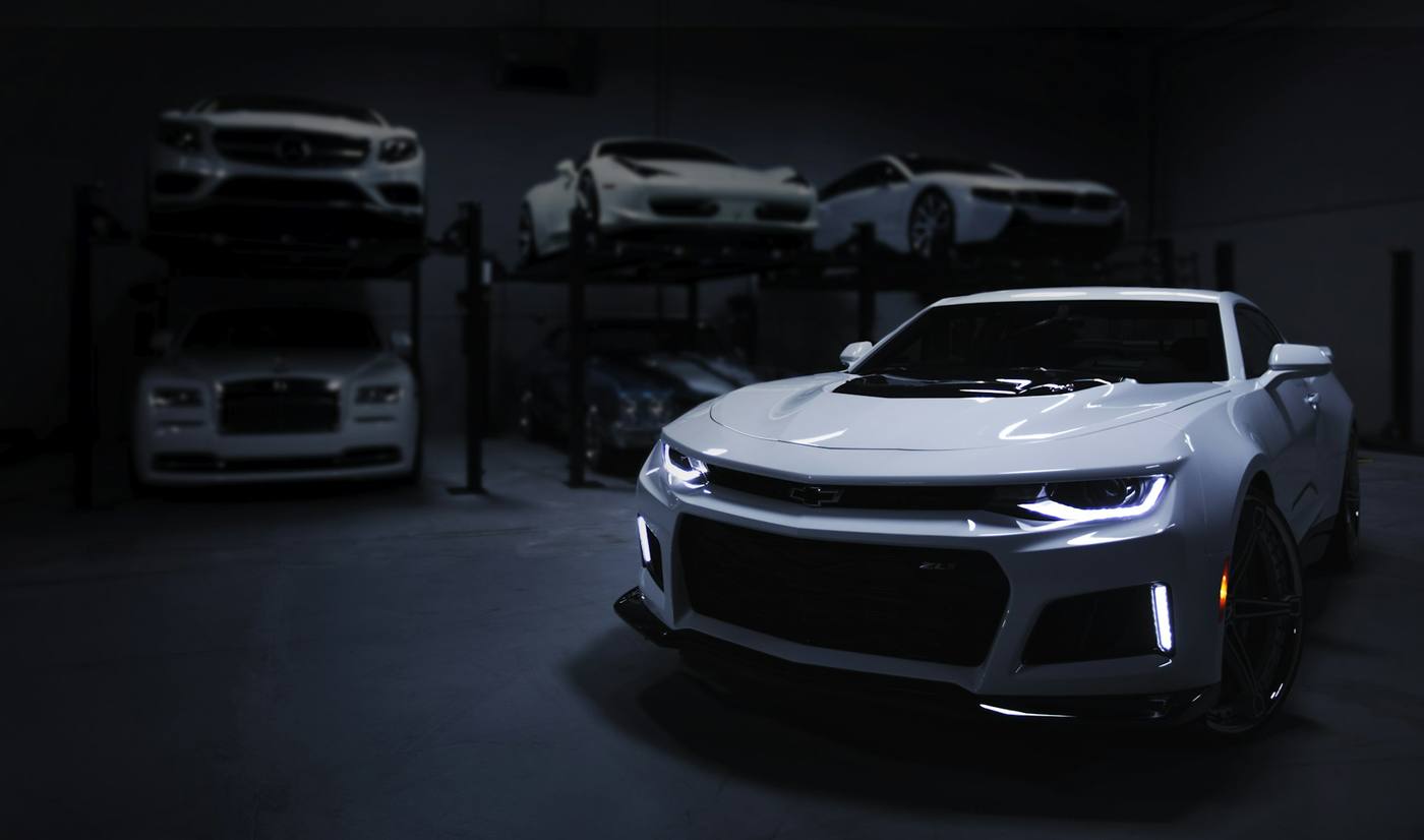 Modified performance car in a dark studio — SM Car Customs Rohini Delhi