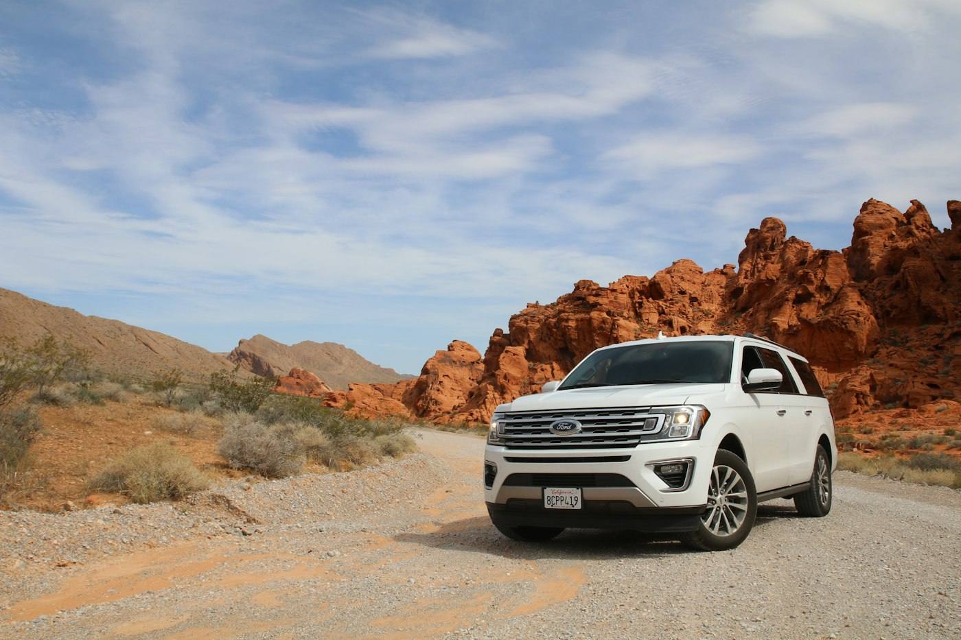 Large white SUV on an off-road trail — representative visual for the Thar ROXX upgrade project